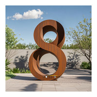 Grande sculpture géante en pierre de rouille en acier corten poli avec pour la décoration de la ville
