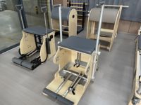 Chaise de Pilates en bois d'érable pour studio à domicile commercial, chaise Wunda avec système à ressorts