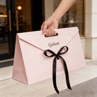 Luxury Paperboard Gift Bag with Gold Edge Recycled Materials Portable Jewelry Wedding Gift Packaging with Bow Ribbon