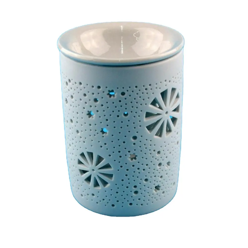 Kleine daisy thee licht oliebrander tart warmer in matte witte afwerking