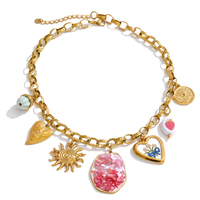 Collier chaîne à maillons en acier inoxydable plaqué or JINYOU 5875 avec pendentif cœur soleil en émail et coquillage naturel rose pour femme