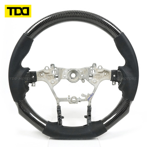 พวงมาลัยคาร์บอนไฟเบอร์แท้ TDD สำหรับ Toyota Hilux สไตล์สปอร์ตเรซซิ่ง ปรับแต่งได้ - Product Image 1