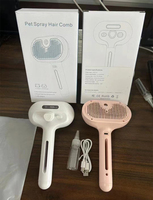 Peigne à vapeur d'eau autonettoyant pour animaux de compagnie à une touche d'épilation Brosse à vapeur pour chat blanc à long manche rechargeable