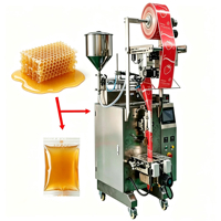 Machine verticale compacte entièrement automatique pour le remplissage et l'emballage de sachets de lait liquide et de pâtes en stick