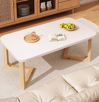 Table basse minimaliste pour salon, pieds en bois, idéale pour petits espaces, table d'appoint pour appartement, location, mobilier de maison