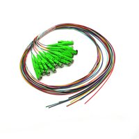 Paquete de 12 Fibras Ópticas Pigtail SC UPC LC APC Monomodo OS2 G657A 0.9mm 3mm PVC 1m 3m Codificadas por Colores Sin Revestimiento FTTH Personalizadas