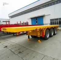 Semi-remorque plateau 3 essieux 40 pieds 60 tonnes usage intensif avec plancher en acier antidérapant, suspension pneumatique et points d'arrimage pour l'exportation