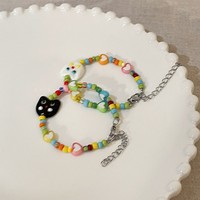 Bracelet perlé pour femme motif tête de chat de dessin animé, mignon et enfantin, noir et blanc