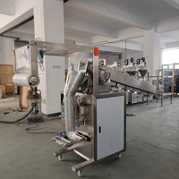 Machine d'emballage manuelle pour chips et snacks à granulométrie large avec bac basculant