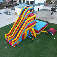 Structure gonflable de saut acrobatique de qualité commerciale avec grande coussinets d'atterrissage et toboggan d'escalade pour la location événementielle