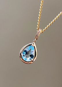 Pendentif pour femme Xinfly en or 18 carats avec pierre naturelle aigue-marine 0,55 carat en forme de goutte d'eau et diamant en forme de larme - Product Image 5