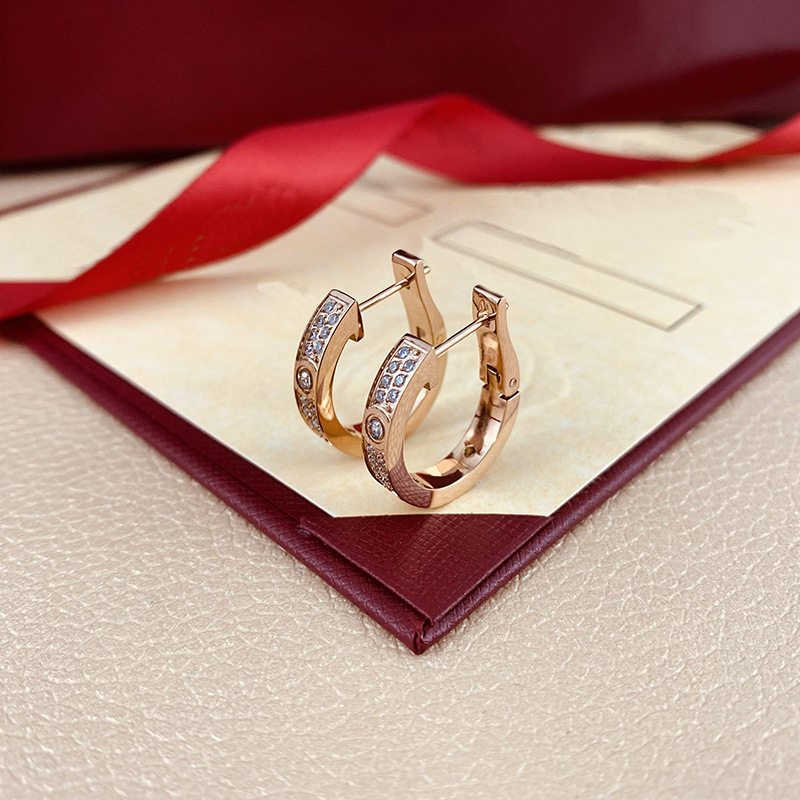 Dos hileras de diamantes+diamante principal.rosa.Pendientes Kaga nuevos