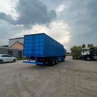Truk Box HOWO 8x4 Off Road Tugas Berat Sinotruk 12 Roda Truk Van Kargo Tertutup Truk Transportasi Logistik Jarak Jauh