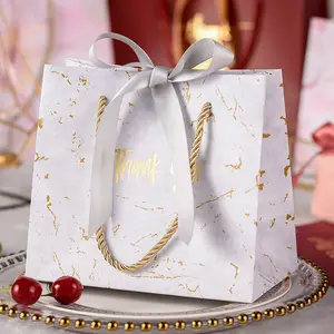 Prijs Elegant op maat gemaakt merk logo luxe winkelen wit papier geschenkzakken met lint handgrepen