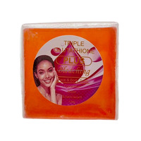 Savon éclaircissant triple action enrichi en acide kojique, glutathion et alpha-arbutine pour un fini frais et éclatant, idéal pour les peaux caramel.