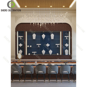 Vitrine à bijoux moderne en verre bleu avec éclairage LED, idéale pour la décoration de bijouterie. - Product Image 2