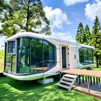 Maison Capsule Spatiale Moderne Minimaliste Écologique pour Studio de Yoga en Pente, Isolée, Résistante aux Intempéries et Ignifuge