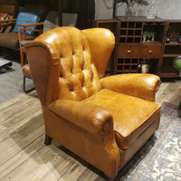 Fauteuil d'appoint de luxe vintage en cuir véritable marron, style Mid-Century, avec boutons capitonnés et dossier ailé, pour hôtel, bureau à domicile, salle à manger et villa