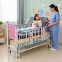 Lit médical pédiatrique mobile anti-chute à double manivelle manuel personnalisé pour enfants, idéal pour les salles d'hôpital et l'utilisation à domicile