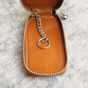 Cartera de cuero impermeable compacta para llaves, bolsa láser, accesorio de coche de PU de tamaño pequeño, caja de regalo con logotipo OEM, función de llavero de coche elegante - Product Image 3