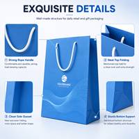 Sacs cadeaux en papier bleu marine de luxe avec poignées en corde à motif soleil doré, logo personnalisé pour les cadeaux d'entreprise, les boutiques de détail