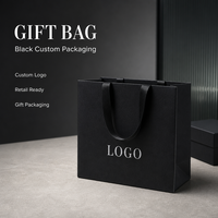 Sac cadeau en papier noir avec logo personnalisé et poignées en ruban pour l'emballage de produits électroniques 3C