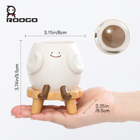 Emballage de coquille d'oeuf Roogo Cartoon Rôle Relaxant Vie Joyeuse Humeur Adorable Nouveau Style Simple Design Chaise Pot avec Plantes Résine