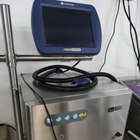 Imprimante jet d'encre industrielle Domino Ax550i d'occasion – Dispositif de marquage haute performance pour le codage des cartons et des bouteilles en plastique