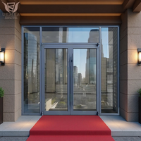 Porte tournante commerciale DEMEA | Conception certifiée de charge de vent pour les halls de bureau de grande hauteur Verre en aluminium de taille personnalisée étanche