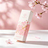 Boîte de soin de la peau personnalisée de luxe avec estampage à chaud en feuille d'or, motif fleurs de cerisier, livraison express en 72h, emballage cadeau en carton imperméable