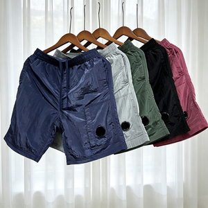 Shorts décontractés unis tendance pour hommes et femmes, séchage rapide, style simple et moderne, collection été 2026 - Product Image 1