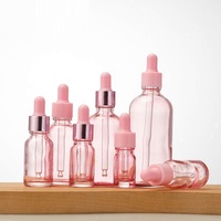 Flacons compte-gouttes en verre d'huile essentielle rose mignon personnalisé de 10ml 30ml 50ml 100ml
