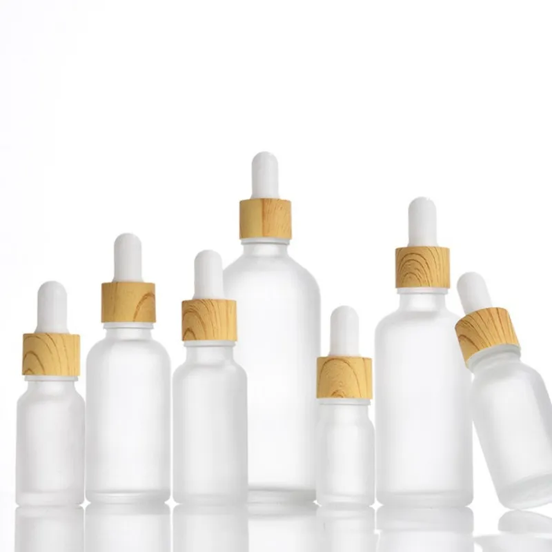 Großhandel Serum Glasflasche Kleine Flasche Glas Tropf flasche Bambus deckel mit Tropfer 30 ml Kosmetik glasprodukte 100 Stk