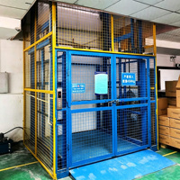 Plateforme élévatrice hydraulique fiable sur rail de guidage pour le transport vertical de matériaux en usine de fabrication
