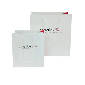 Custom Luxury Printed Logo Shopping Paper Gift Bag With White Rope Handles