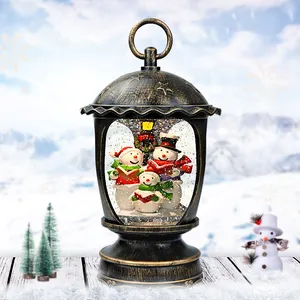 Venta al por mayor de la fábrica de lámparas luces regalos de muñeco de nieve escena Navidad globo de agua linterna