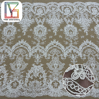 Haute qualité cordon de mariée broderie Sequin Tulle dentelle tissu lourd blanc paillettes brodé maille dentelle tissu pour robe de mariée