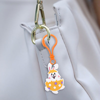 Porte-clés promotionnel personnalisé en caoutchouc en forme de lapin de Pâques, design anime, étanche, imprimé UV, léger, personnalisable, marque DM