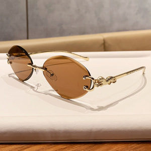 Gafas de sol sin montura con diseño de mariposa para mujer, protección solar UV400, estilo moderno para adultos - Product Image 2