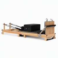 Reformer Pilates en chêne massif pliable rapidement avec roulettes, certifié CE, équipement de fitness facile à ranger pour studio
