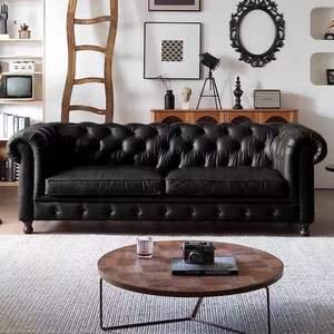 أريكة تشيسترفيلد جلدية مخصصة بتصميم عتيق مع أزرار ومساند ذراع ملفوفة، مناسبة لغرفة المعيشة والمكتب والفندق - Product Image 3