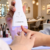 SNRQI Lámpara UV LED Inalámbrica Portátil 2 en 1 de Venta Caliente para Uñas de Gel con Luz de Curado Rápido y Secador de Haz Enfocado al por Mayor
