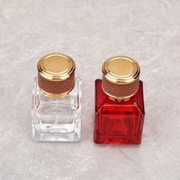 Flacon pulvérisateur atomiseur carré transparent de haute qualité de 50 ml avec bouchon en verre rouge sérigraphié