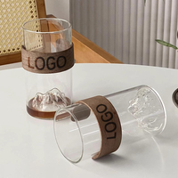 Verre à long drink créatif transparent en forme de montagne avec base ambrée, pour bière, whisky, café, avec manchon en bois