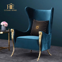 Fauteuil contemporain avec décor tête de ram, en cuivre pur, dossier haut, finition chrome doré, velours, siège individuel