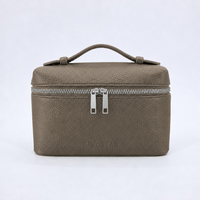 Sac de toilette de luxe en cuir PU texturé avec logo gaufré, double fermeture éclair, poignée supérieure, pour femme, idéal pour les voyages