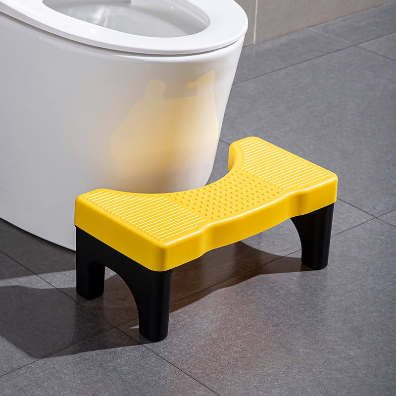 Stool with gray surface and black legs