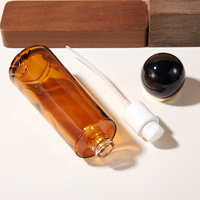 Bouteille en verre de luxe personnalisée en gros, ronde ambrée et carrée noire, pour sérum, lotion, parfum, huile, avec bouchon à bille et pulvérisateur rechargeable