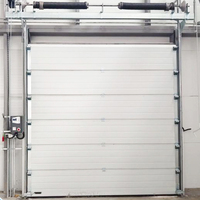 Porte sectionnelle industrielle victorienne robuste avec isolation thermique pour applications en cour