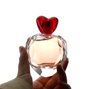 थोक दिल के आकार की इत्र की बोतल बॉक्स के साथ कस्टम ग्लास इत्र की बोतलें ग्लास इत्र की बोतल 100 मिलीलीटर